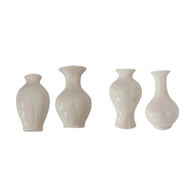 

4Pcs Artistic Ceramics Fridge Magnets with Hollowout Design for Flowers Mini Plant Pots Vases Kitchen Office Decoration 1