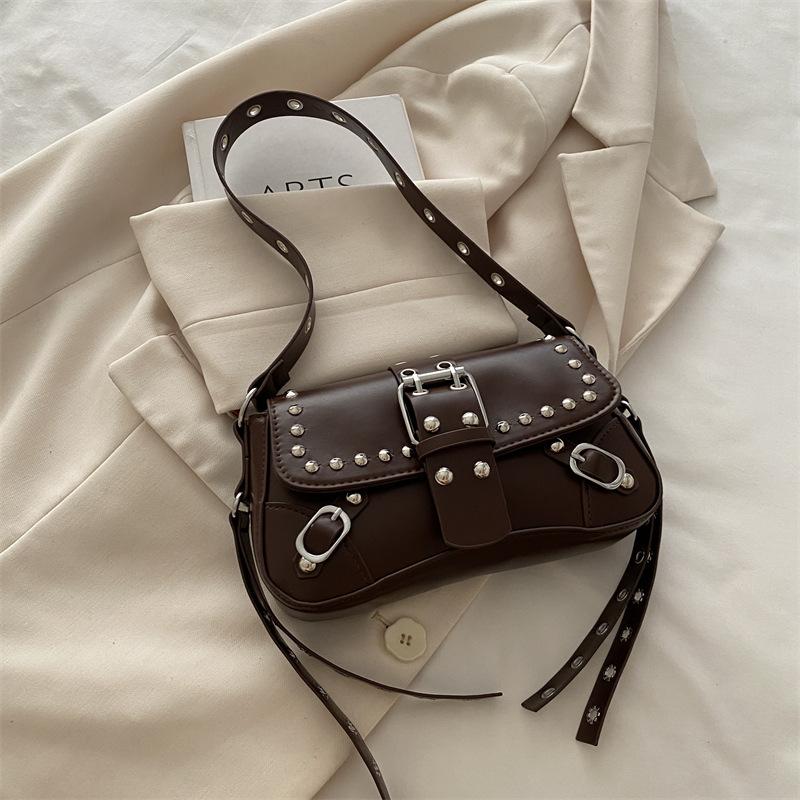 2025 New Shoulder Messenger Bag Texture Trendy Cool Spice Girl Rivet Personalized Design Locomotive Fashionable Underarm Baguette Bag