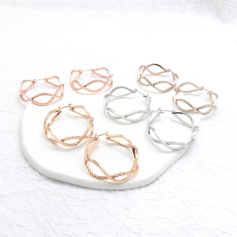 Geometryczne Modne Skręcane Skręcane Hollow Carving Kolczyki