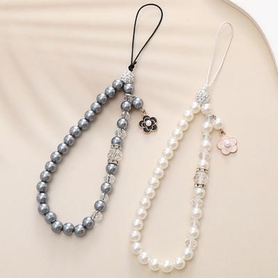 Accesorii pentru telefoane – Curele și brelocuri pentru telefoane