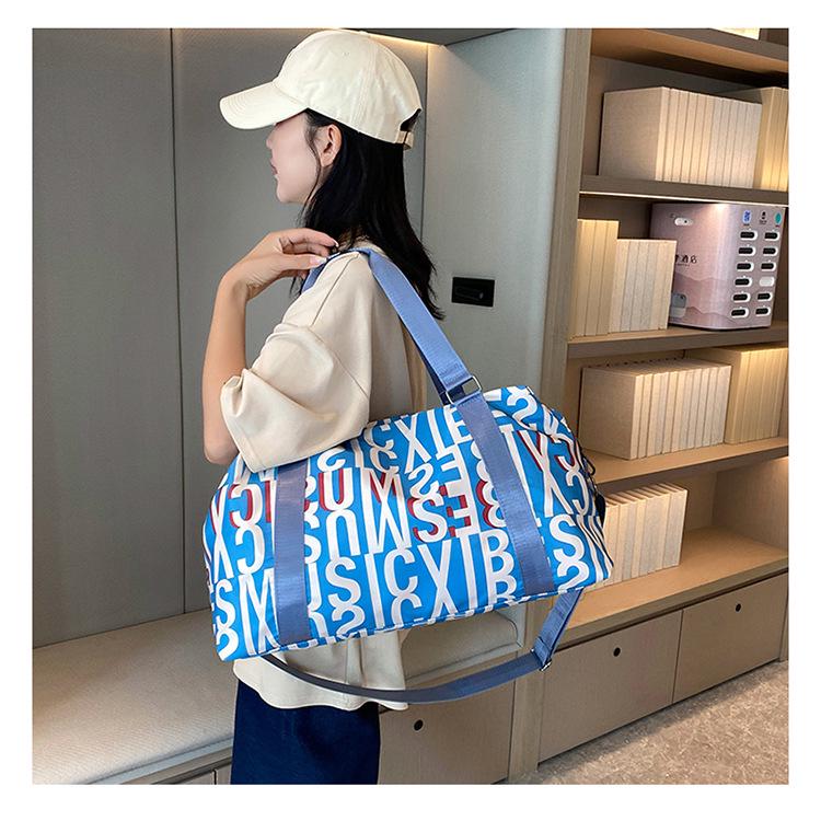 Multifunctional Yoga and Sports Travel Bag with Dry/Wet Separation, Large Capacity, and Trolley-Ready Design.