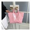 This Water-Resistant Pvc Tote Bag Features A Pink And Blue Striped Design, A Large Capacity, And Is Suitable For Beach Shopping,