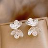 Boucles d'Oreilles Clous Fleur en Métal Français Élégantes pour Femmes - Haut de Gamme, Tendance, Polyvalentes, Style Cool