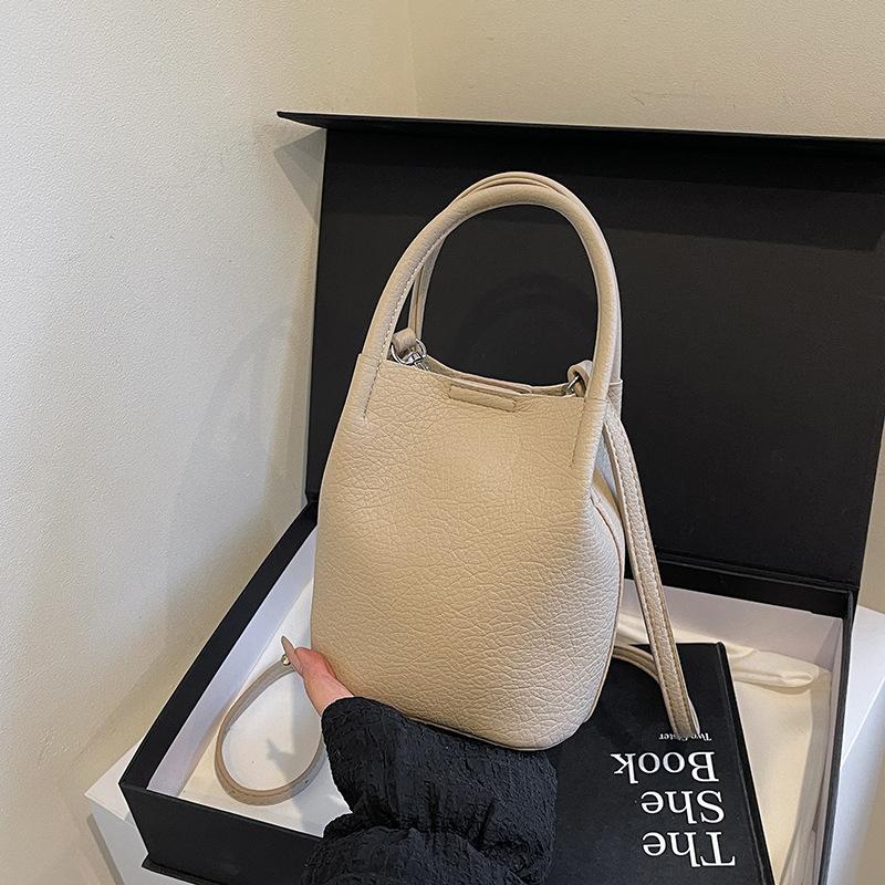 Premium Sense Niche Child Mother Bag Women's Spring and Summer 2025 New Retro Messenger Bag Women's Hand-held Pleated Bucket Bag