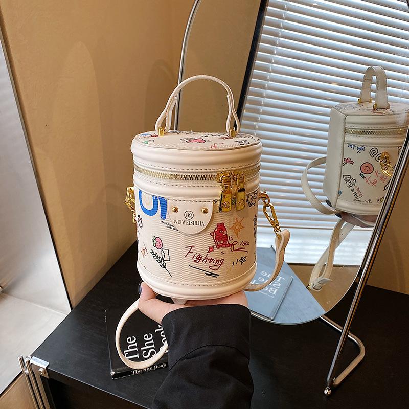 High sense niche mini bag women's summer new fashion messenger bag portable bucket bag