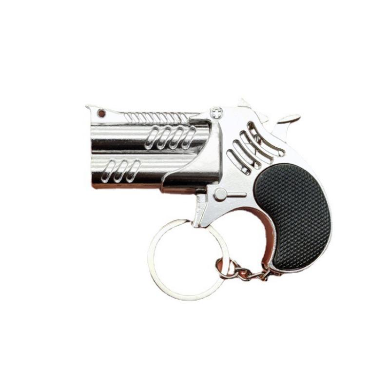 1Pcs Mini Keychain Metal Rubber Band Gun Game Toy Gun Launcher საბავშვო სიმულაციური პისტოლეტი სათამაშოები საჩუქრები საკიდი