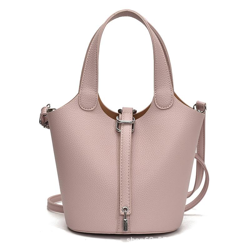 Korean version of the foreign style hand-held bucket bag women's 2025 new niche design mother and child bag commuter shoulder crossbody bag