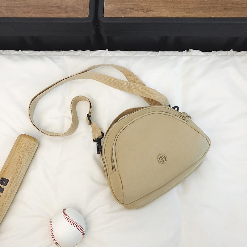 Hong Kong Style Women'S Small Satchel Trendy Simple Messenger Bag Casual Small Round Bag Tooling Style Couple Shoulder Nylon Bag