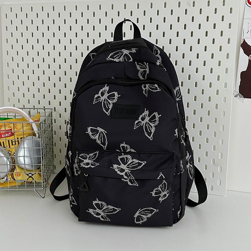 

Japanese style butterfly backpack female junior high school female primary school schoolbag large capacity travel light backpack
