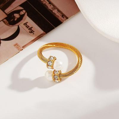 Ying Tai 18 Karat Gold Edelstahlring mit Imitationsperle & Zirkonia