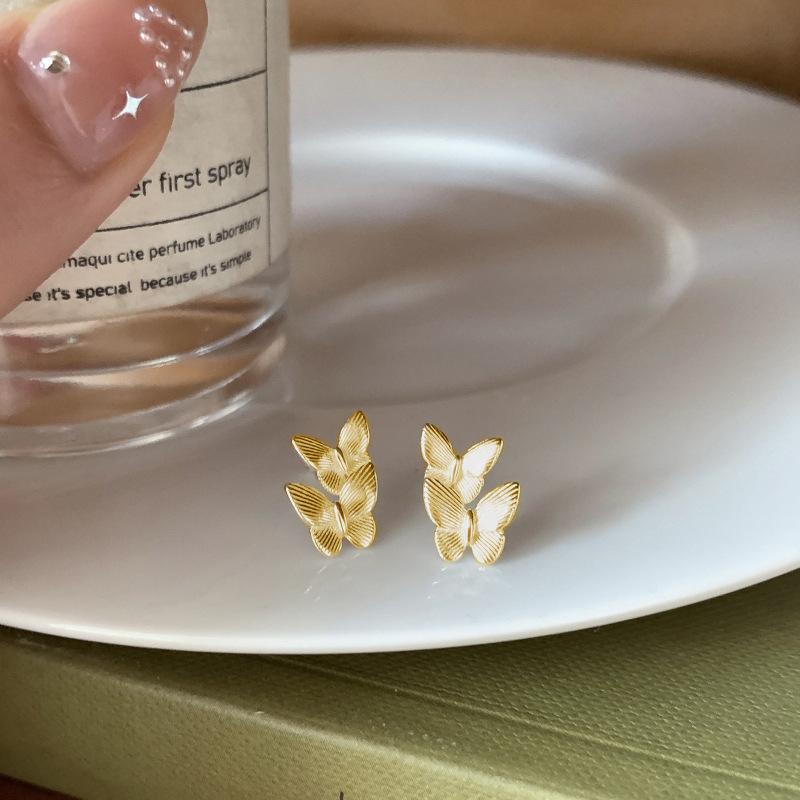 

Серьги с двойными бабочками Женский темперамент Нежные Милые Атмосферные Чувство Сотни с Серьги-лассо Женские Аксессуары Ювелирные изделия