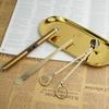 Aroma Candle Tool Kit: Wick Trimmer, Snuffer, Extinguishing Hook, and Tray.