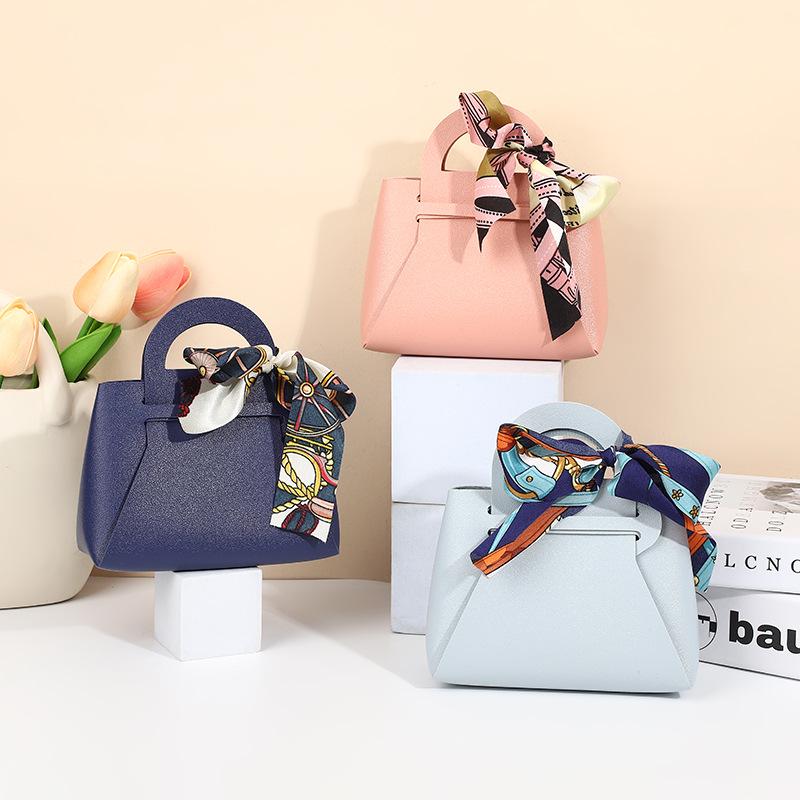 Europäische Handtasche aus PU-Leder im leichten Luxus-Stil & Süßigkeiten-Geschenkbox