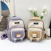 New primary school students backpack women's new large-capacity first and second grade schoolbag simple and fashionable contrasting color backpack