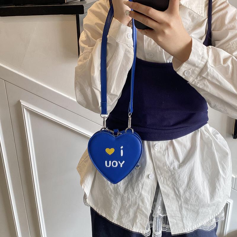 2025 summer new cute casual style small bag women's niche design sense messenger bag printed heart-shaped mouth red envelope