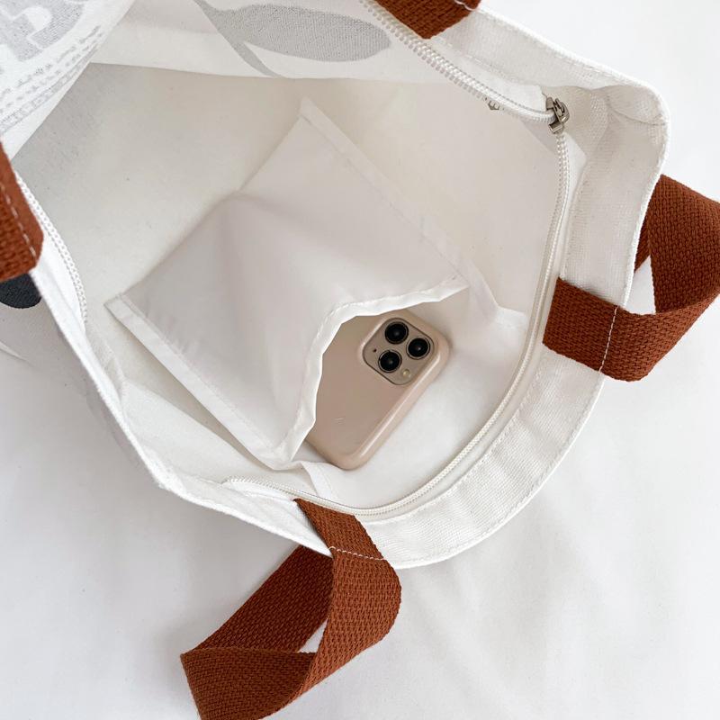 Canvas Bag Women's High-value Niche Cartoon Shoulder Bag Going Out Large-capacity Book Bag