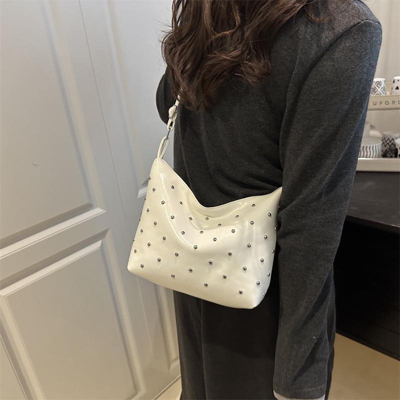 Stylish and simple rivet underarm bag women's new versatile dumpling bag high-end retro messenger bag