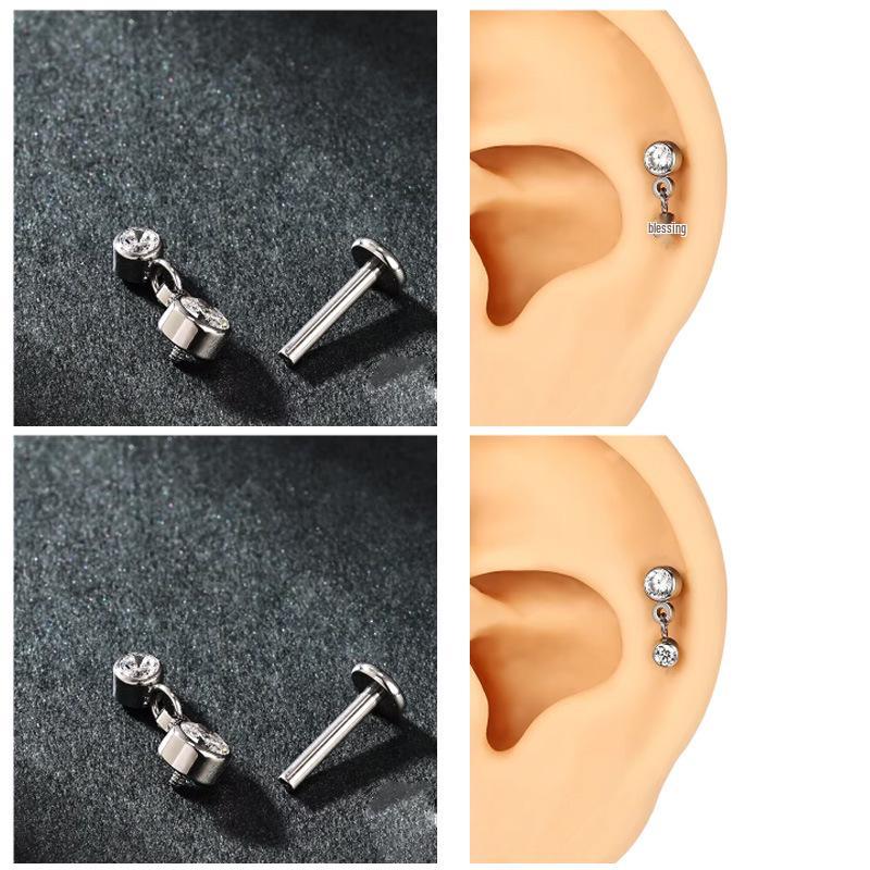 G23 Titanium Cartilage Stud with Zircon Chain and Lightning-Inlaid Titanium Lip Stud.