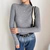 Semi-turtleneck solid color bottoming shirt women's autumn and winter 2026 new sweater long-sleeved slim-fitting middle-neck knitted sweater commuter 