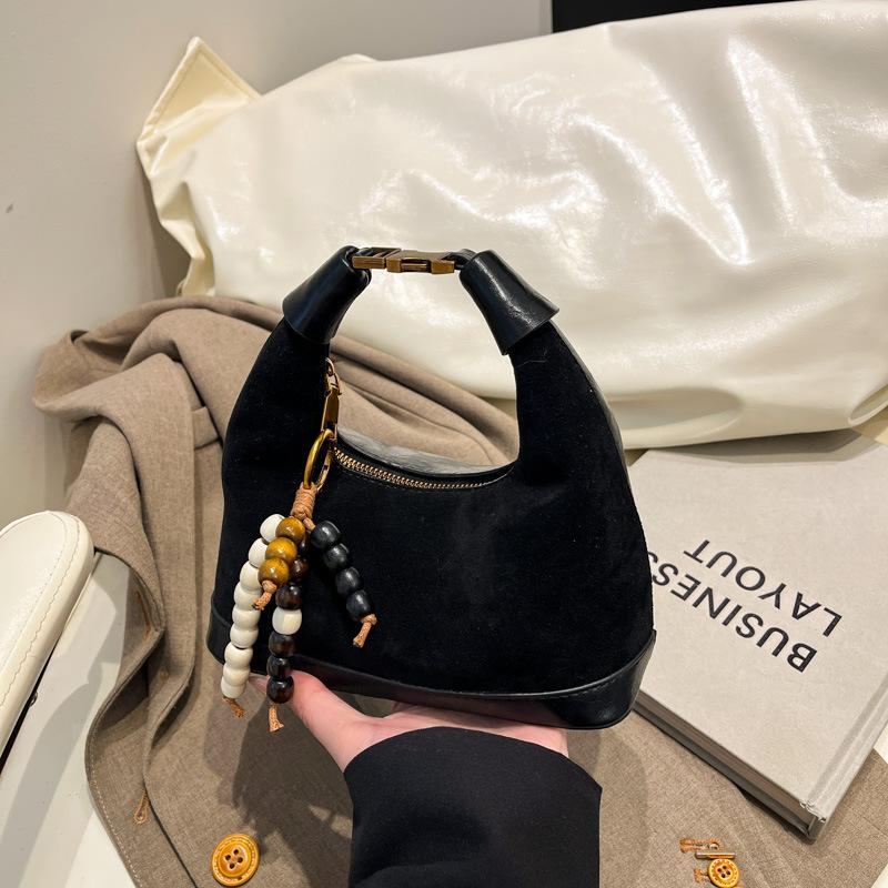 Premium sense niche bag women's autumn and winter 2025 new matte retro messenger bag casual explosion portable dumpling bag