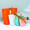Festival Souvenir Gift Bags: White Cardboard Handheld Bags for Ornaments, Cosmetics, and General Packaging