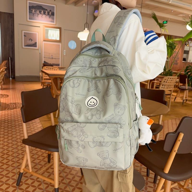 

Graffiti backpack female college students niche design high school students junior high school casual backpack large capacity schoolbag new