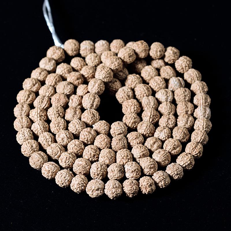 Handcrafted Dragon Scale Bodhi Seed Bracelet with Red Burst Finish