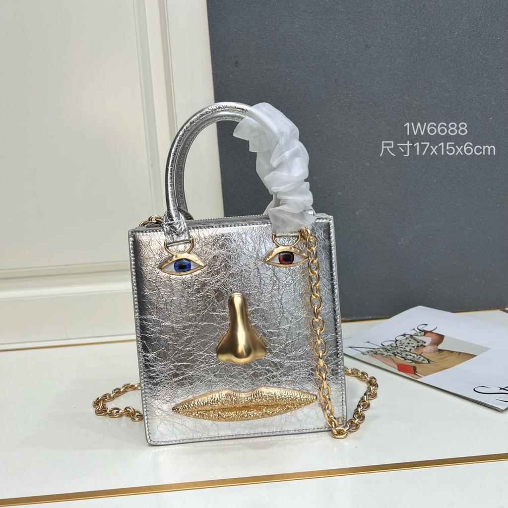 26 trendy new schiap face women's bag plain weave cowhide chain design sense hand-held tote bag