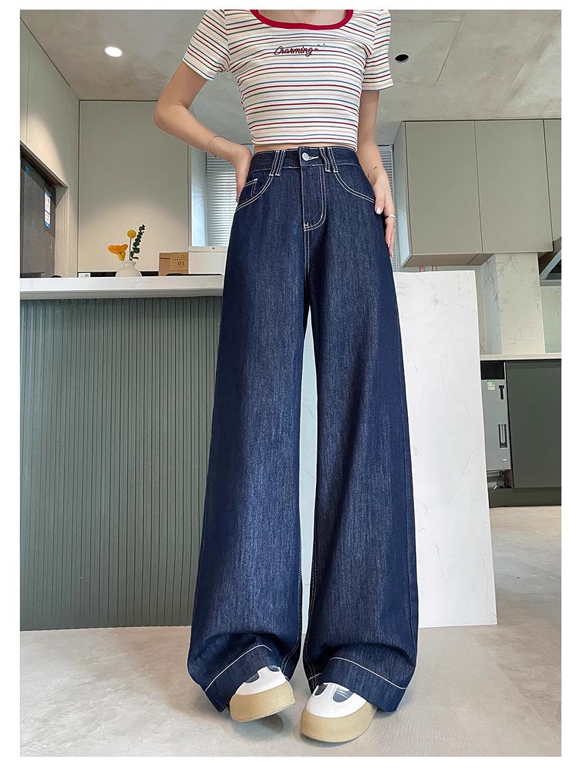 

Женские джинсы из темно-синего денима с высокой посадкой и кожаной нашивкой - Свободные, широкие штанины, длина до пола S синий