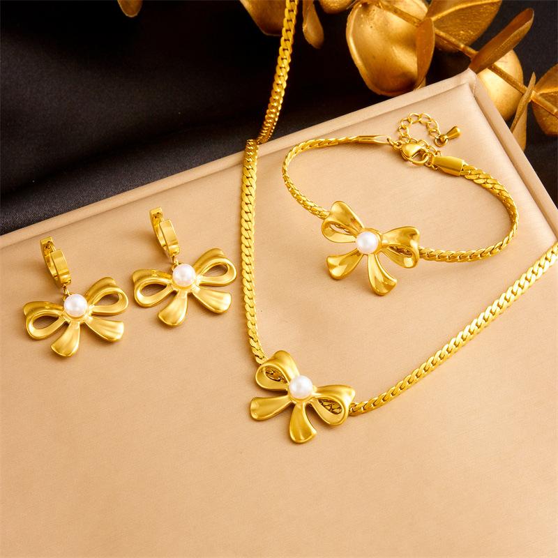 

Gold Plated Bowknot Faux Pearl Jewelry Set Necklace Bracelet Earrings for Women Stainless Steel золотой