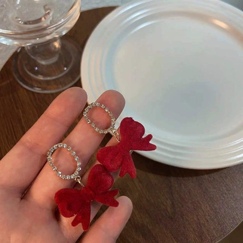 2025 New Year Red Velvet Pearl Earrings: Retro Hong Kong Style Whitening Studs for Women