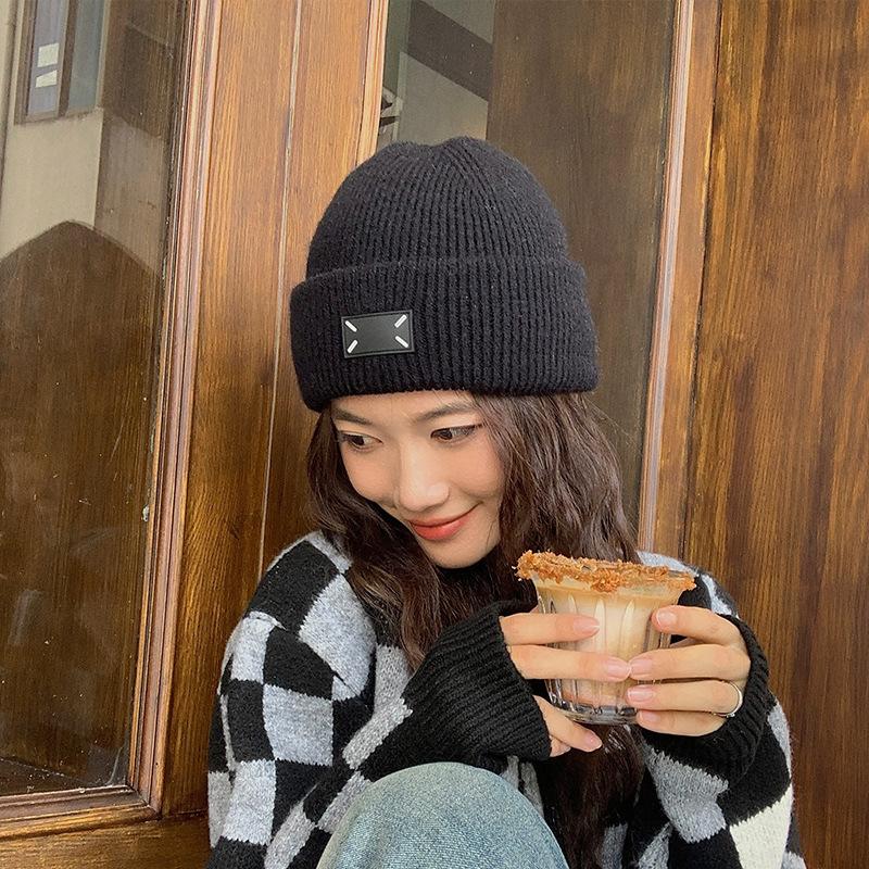 Winter new thick wool knitted hat warm versatile bag head hat flanged ear protection fashion wool hat women's cold hat