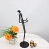 Modern Light Luxury Living Room Sculpture: Ball-Holding Figure Metal Ornament for Hotel and Exhibition Hall Decor