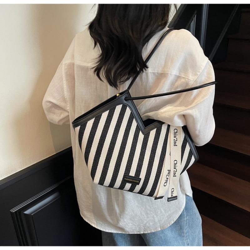 Striped canvas bag women's large-capacity new summer niche shoulder armpit bag college student class bag
