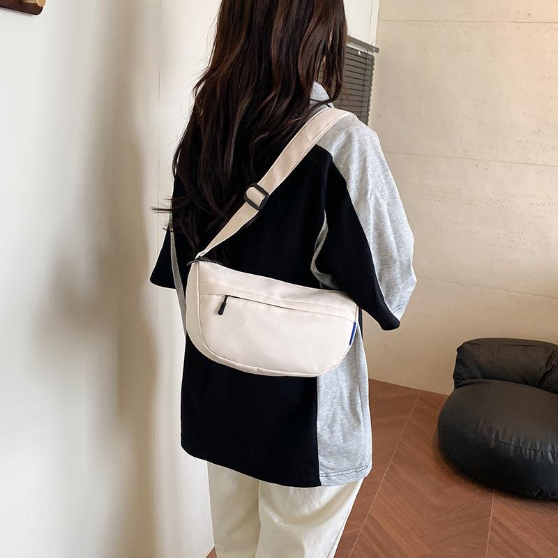 Men's and Women's Bags Japanese Dumpling Bags Niche Simple Shoulder Messenger Bags Men's Bags Travel Portable Cross-bag Casual Backpack