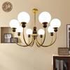 Mid-Century Magic Bean Solid Wood Chandelier: French Retro Light for Living Room or Bedroom.