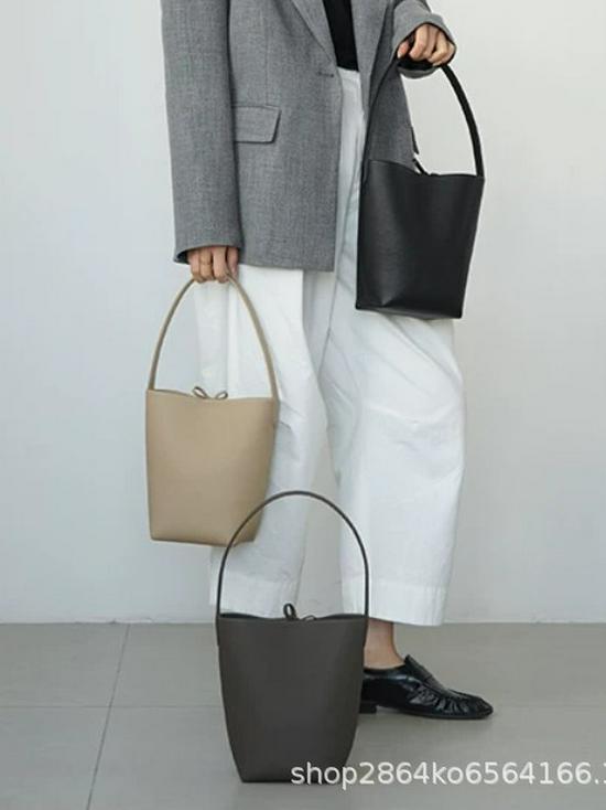 2024 Cowhide Leather Bucket Bag: Minimalist, Large-Capacity Commuter Tote for Women