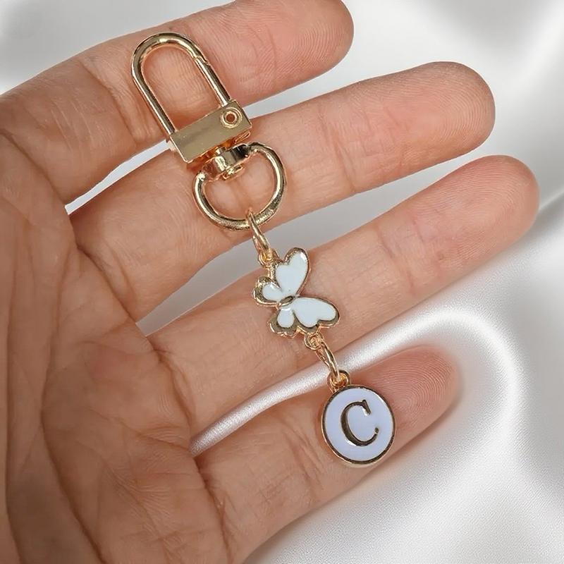 Metalowy Brelok z Literą Motyla A-Z 26 Liter Brelok Urok Uchwyt na Klucze Samochodowe Zawieszka do Torby Akcesoria Biżuteria Prezent