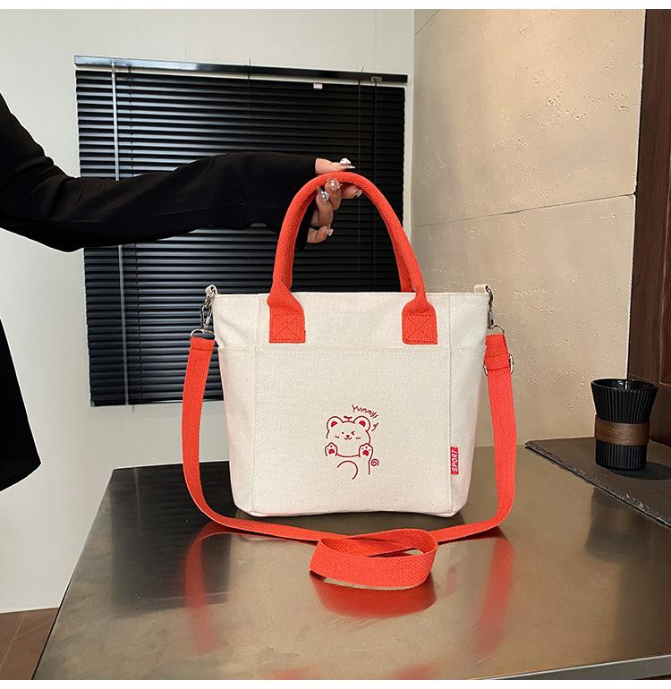 Korean Contrasting Color Portable Canvas Bag Women's 2025 New Casual Messenger Bag Popular Literature Cute Commuter Bag