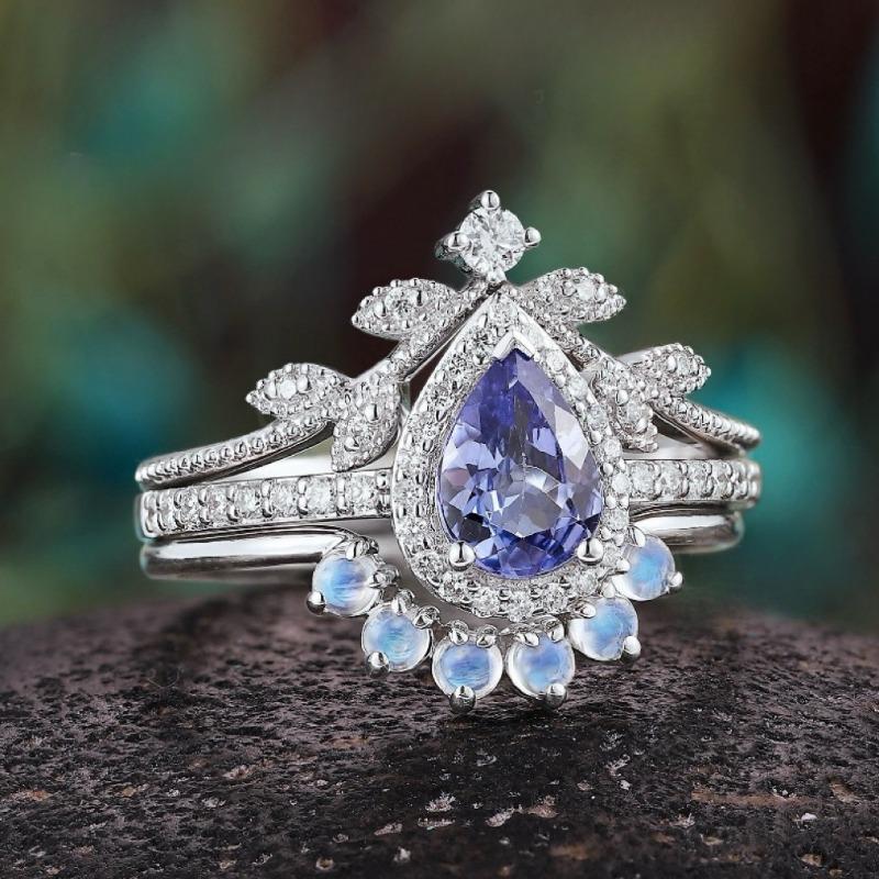 European and American new fashionable blue water drop-shaped gemstone inlaid with personalized luxury women's three-piece ring