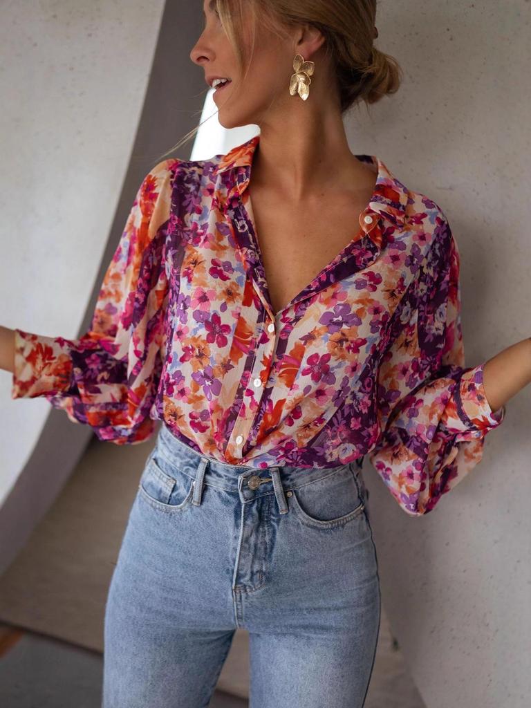 Lebhafte pinke und orangefarbene florale Chiffonbluse mit langen Ärmeln