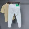 2024 Summer Men's White Slim Fit Jeans - European Style, Simple, Fashionable, All-Match Casual.
