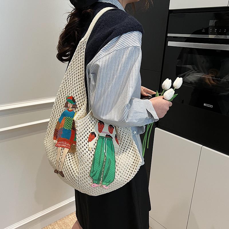 Summer hollow woven straw bag women's large capacity 2025 new casual shoulder bag seaside vacation wind beach bag