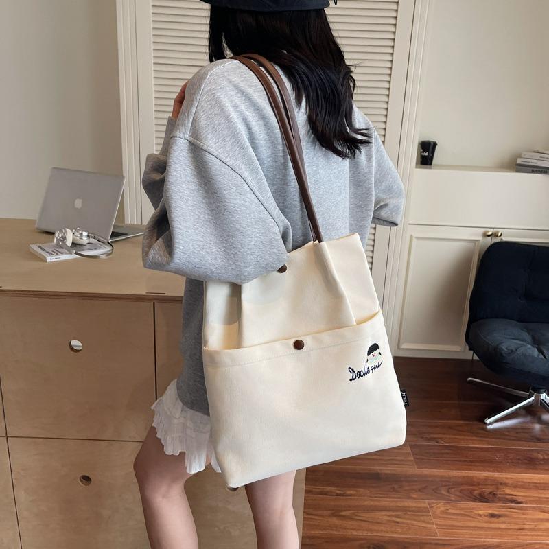 Casual versatile canvas bag women's new light commuter shoulder bag large capacity tote bag