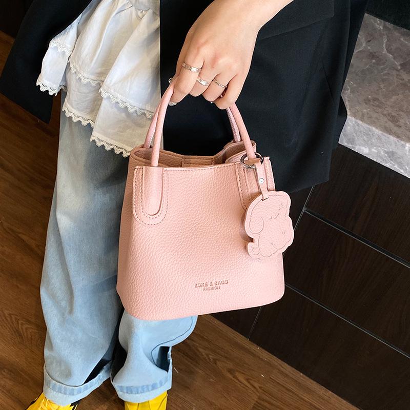 Textured foreign style small bag women's 2025 spring new popular versatile messenger bag fashionable women's portable bucket bag