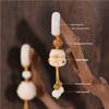 Bodhi Runner Ivory Fruit Tassel with White Jade Lotus Pendant