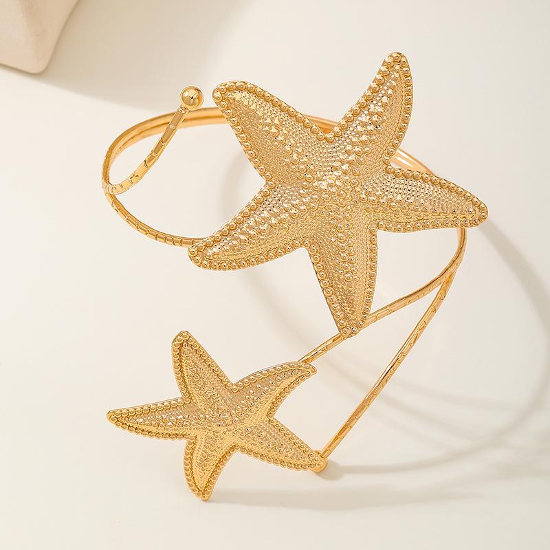 Meier Trendy ocean-inspired metal gold starfish shell statement jewelry - women s arm cuff - vacation style