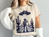 Cowboy UFO-bortføring T-skjorte, Ørkenromvesen-møte Tee, Sci-Fi Western Grafikk, Unik Romcowboy Topp, Retro Utenomjordisk Design