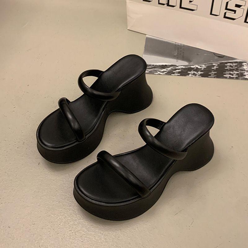 Temperament advanced sense one-word slippers women's summer wear new small thick-bottomed wedge heel high-heeled muffin slippers