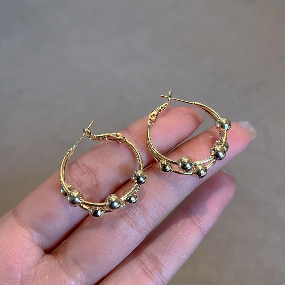 

Cold Wind Double Layer Metal Ball Circle Earrings Light Luxury Design Temperament Earrings Earrings золотий